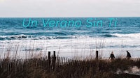 two people walking along the beach with the words un verano sin ti